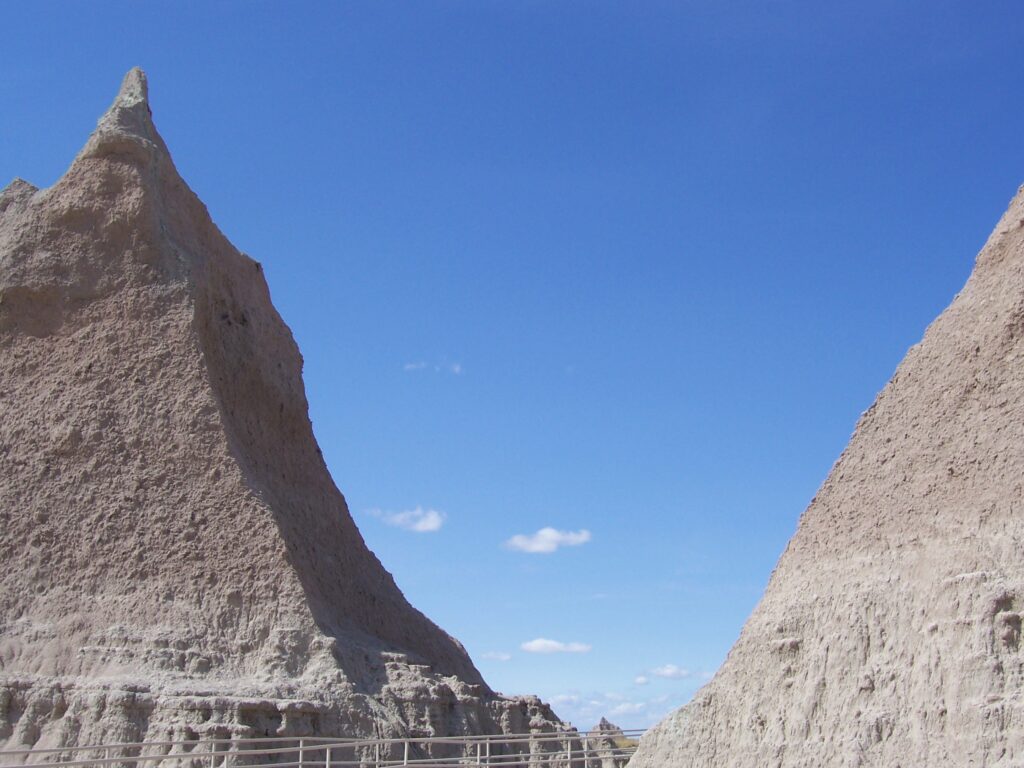 Blue sky outlines sheer cliffs