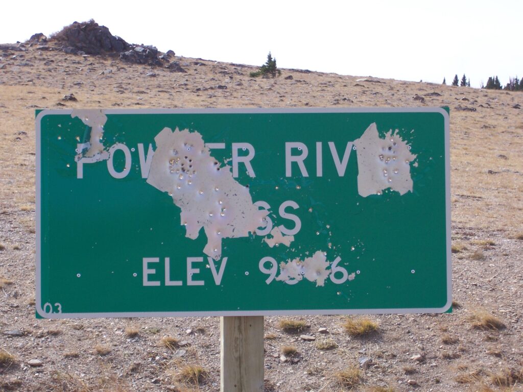 sign-pelted-by-bullets
