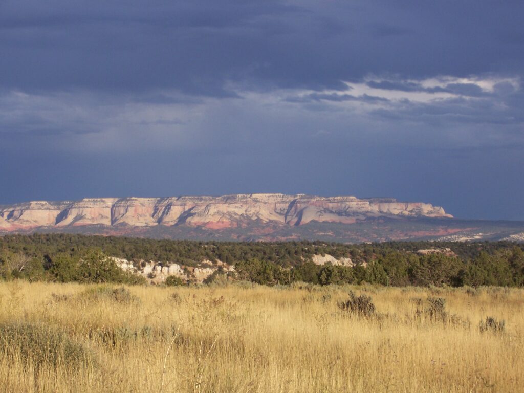 photo-outside-zion-distant-mesa-dark-sky-background
